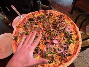 E-nooooooormous!!!!!  at Fat Badgers Pizza Bar in Queenstown