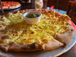 Cheesey garlic bread - comes with pesto dip. Yum!  at Fat Badgers Pizza Bar in Queenstown