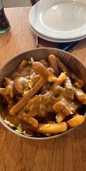 Vegan cheesy curry chips - large  at Fat Badgers Pizza Bar in Queenstown