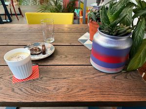 My comforting turmeric black pepper almond milk latte with my scrumptious chocolate desserts at Carbon Fresh in London