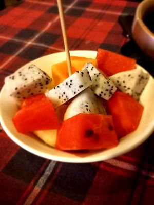 Complimentary happy hour fruit salad :) at Bar How in Huay Xai