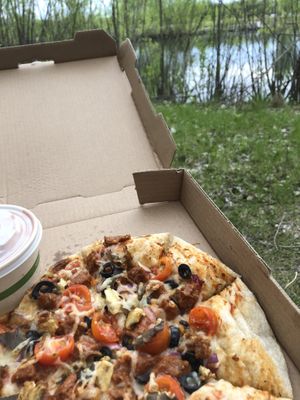 Deluxe pizza with vegan sausage at Daily Clean in Sioux Falls