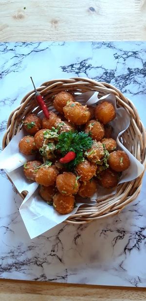 garlic & spicy potato balls , very special one  at Hummus Heads in Bangkok