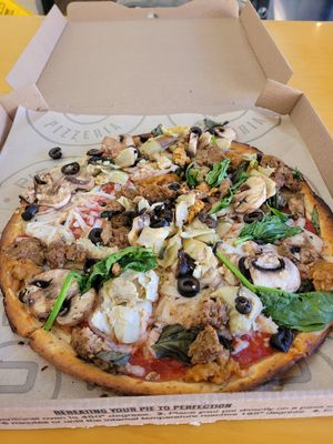 Cauliflower crust, vegan meatball, sausage, veggies at Pieology - Marketplace in Irvine