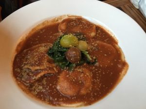 Ravioli with cashew ricotta in a tomato sauce. Dinner entree. at Ravens' Restaurant in Mendocino