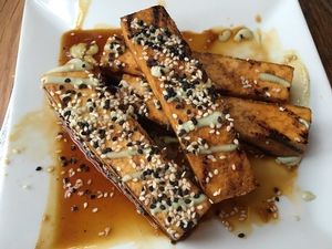 Braised tamari tofu... Share as an appetizer, too large for one person especially if ordering an entree. at Ravens' Restaurant in Mendocino