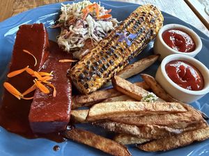 Tofu with barbecue sauce, coleslaw, corn, and fries  at Ravens' Restaurant in Mendocino