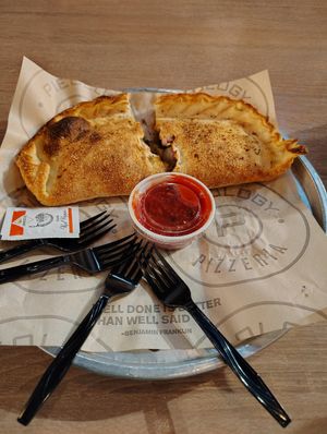 Vegan Calzone...meat, cheese, onions, mushrooms, garlic, green peppers & artichokes. 10/10 at Pieology - MGM Grand in Las Vegas