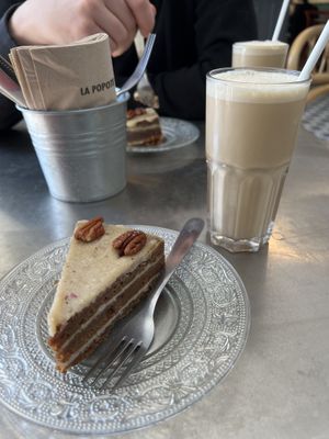 Carrot cake and dirty chai iced oat milk latte   at La Popote D'Ondine in Nice