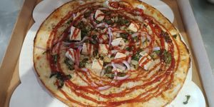 $11.95 Veganized Thin Crust Fire Grilled BBQ Chicken: sub vegan cheese, sub vegan chicken at Pieology - George Dieter Dr in El Paso
