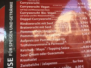Wall menu--note Curyworscht vegan options. at Best Worscht In Town - Grüneburgweg in Frankfurt
