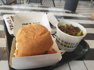 Burger and pesto pasta at Beatnic - Seaport District in New York City