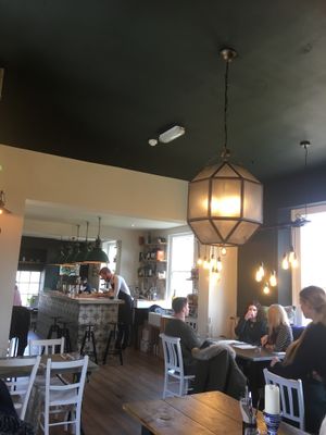 Cute decor. I love the dark ceiling.  at Hypha in Chester