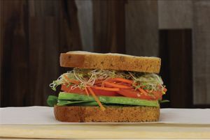 Immune Sandwich: Gluten Free Bread, Cucumber, Tomato, Carrot, H*mp Seed, Mint, Baby Leaf, Almond.
 at Gaia Therapeat in Hollywood