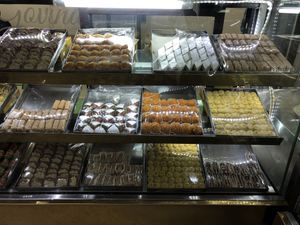 Big variety of typical Indian sweets made with pistachios, cashew nuts, chick pea flower, etc…, and tons of sugar 😍  at Govinda's in Lusaka