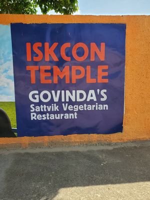 Outside wall.  Pass through security, turn left. at Govinda's in Lusaka