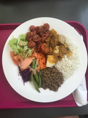 Vegan sausage, soy Colombo (the curry) lentils, rice, green beans, yucca and salad with a soy dressing  at Le Sunny in Fort-de-france
