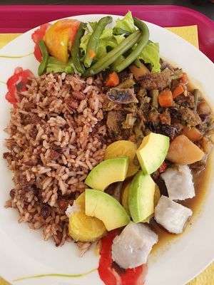 Big portion of traditional Caribbean flavours. Colombo, rice and beans, plantain, dachine. Delicious. at Le Sunny in Fort-de-france
