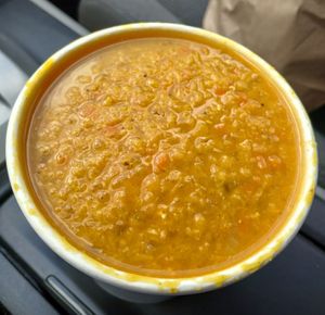 16oz Jamaican Yellow Curry Lentil Soup: red lentils, onion, carrots, ginger, jalapeño, coconut oil, yellow curry powder, tomato, ume plum vinegar at Grateful Bread - Freakbeat Vegetarian in Lincoln