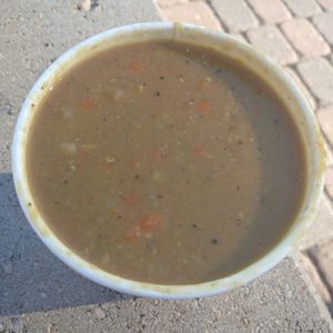 16oz Curried Red Lentil Soup: onions, garlic, ginger, curry powder, olive oil, red lentils at Grateful Bread - Freakbeat Vegetarian in Lincoln