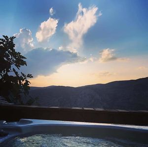 Enjoy sunset from the jacuzzi  at Casa Tarsan Vegan Eco Lodge in Villalonga