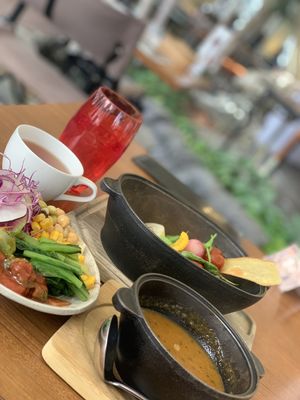 Lunch meal with salad buffet plate, soup, tea and water at Terra in Sapporo