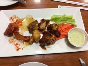 Cauliflower “wings” buffalo, honey mustard, bbq at Foodamed in Mc Allen