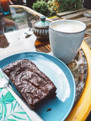  Vegan brownie & an oat milk latte  at Passiflora in Seaton