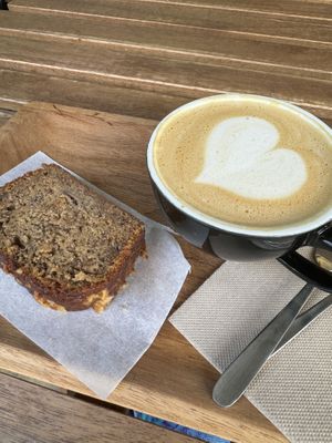 Latte with oat milk + Banana bread   at Jester in Sevilla