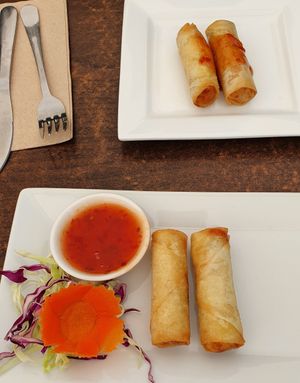 Spring rolls with sweet & sour dipping sauce. at Green's in Paihia