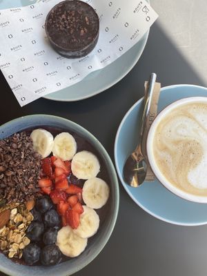 Raw brownie doesn’t resemble a brownie at all. About 1/5 is an base, the rest is just a block of thick dark chocolate. Too heavy I couldn’t eat it and I’m chocolate obsessed! at Roots LaMarca in Madrid