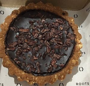 Vegan chocolate tart at Roots LaMarca in Madrid