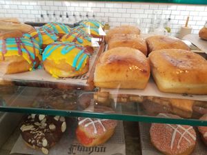 Pictured on bottom both the chocolate and garden donuts are vegan. The donuts onto are not vegan at Kudough's Donuts in San Juan