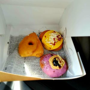 Glazed, on&J and passion fruit donuts (the only fully vegan that day) at Kudough's Donuts in San Juan
