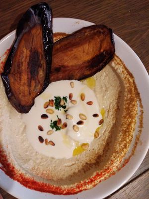 Hummus tahini plate with aubergines and pine nuts (optional) at Hummus Bar - Buda in Budapest