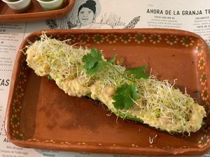 Tosta Vida Mia- toasted rye bread with homemade hummus and avocado spread with alfalfa topping.  at La Casa de las Mayoras in Cancun