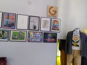 There is a second hand clothing shop next door! at The Glad Cafe in Glasgow