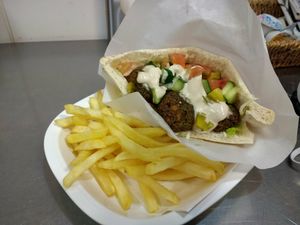 Falafel sandwich and French fries at Falafel Sababa in Osaka
