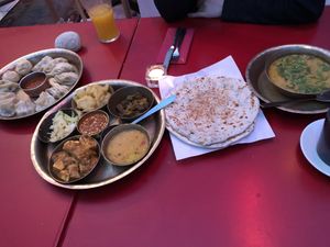 Vegan momos, vegan mixed plate, vegan flatbread with potato  at YAK + YETI in Vienna