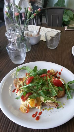 Avocado and scrambled tofu on toast, with sriracha and salad at Pear Kitchen in Cowbridge