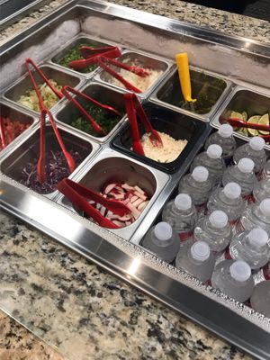 Toppings  at Veegos in Houston