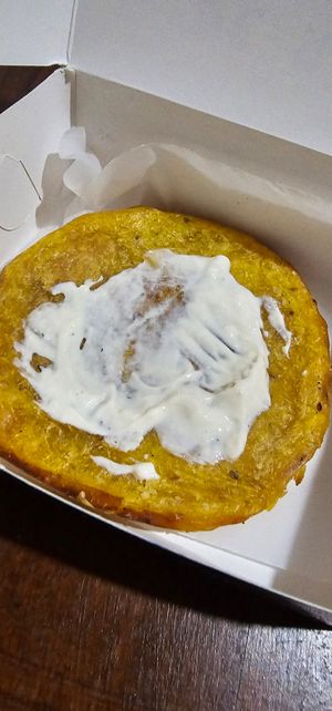 Arepa de yuca con natilla. at De/Raiz Cocina Café - Calle 106 in Bogota