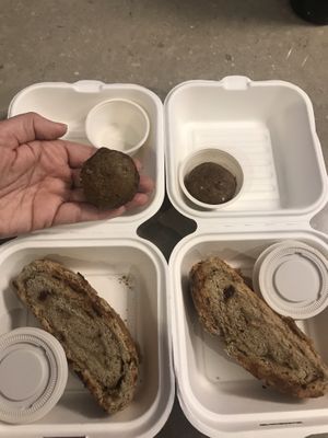 “Cinnamon Rolls” with barely cinnamon, dry, no flavor + two of the tiniest “muffins” I’ve ever seen. at De/Raiz Cocina Café - Calle 106 in Bogota