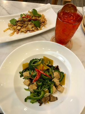 Banana blossom salad (good). Pumpkin and bitter gourd (quite bitter). at Tonklar Facai - Chula in Bangkok