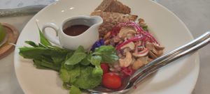 Grilled tempeh with herbs at Tonklar Facai - Chula in Bangkok