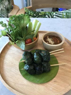Mushrooms wrapped in wild betel leaf at Tonklar Facai - Chula in Bangkok