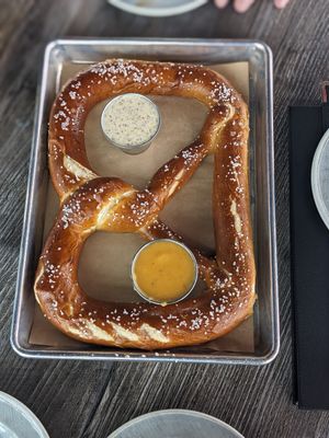 Bavarian pretzel with vegan cheese and agave mustard at Collision Brewing Company and Restaurant in Longmont