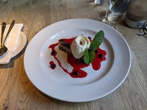 Vegan polenta cake with vegan vanilla ice cream at The Pine Marten in Harrogate