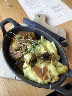 lentil loaf with mashed potatoes and brussels sprouts! at Veganika in Ljubljana