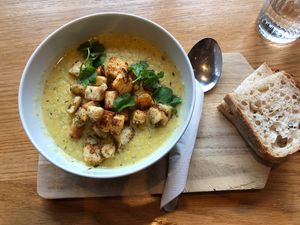 creamy corn soup with thyme croutons 💕  at Veganika in Ljubljana